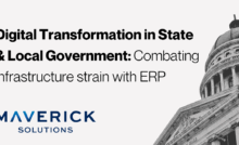 A State and Local Government building from a low angle pointed up towards the peak of the building. Text reads, "Digital Transformation in State & Local Government: Combating infrastructure strain with ERP."